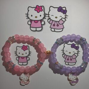 Pink and purple Hello kitty strawberry magnetic heart bracelets